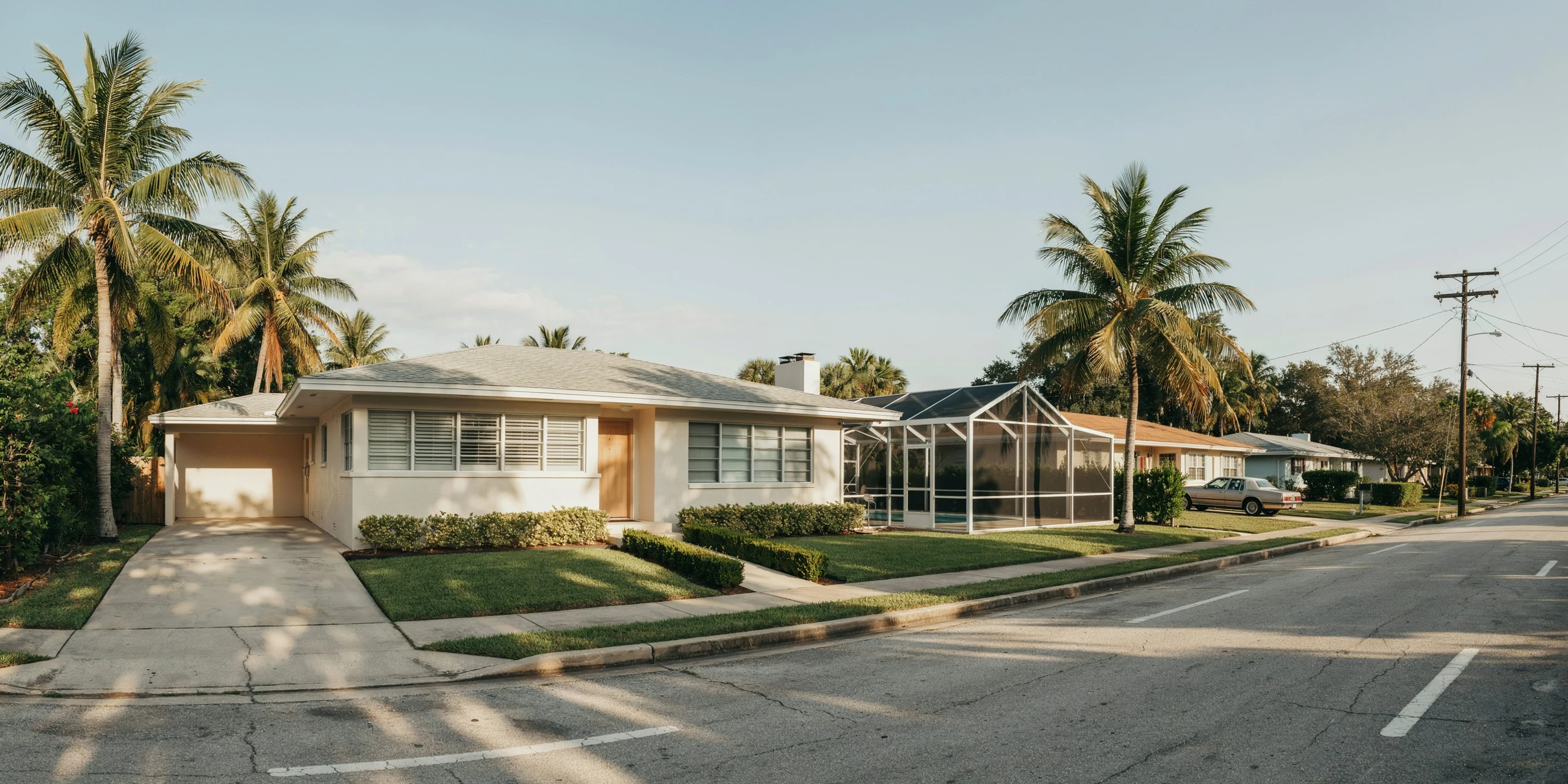 Mid-century ranch home with a pool cage in Bradenton, FL