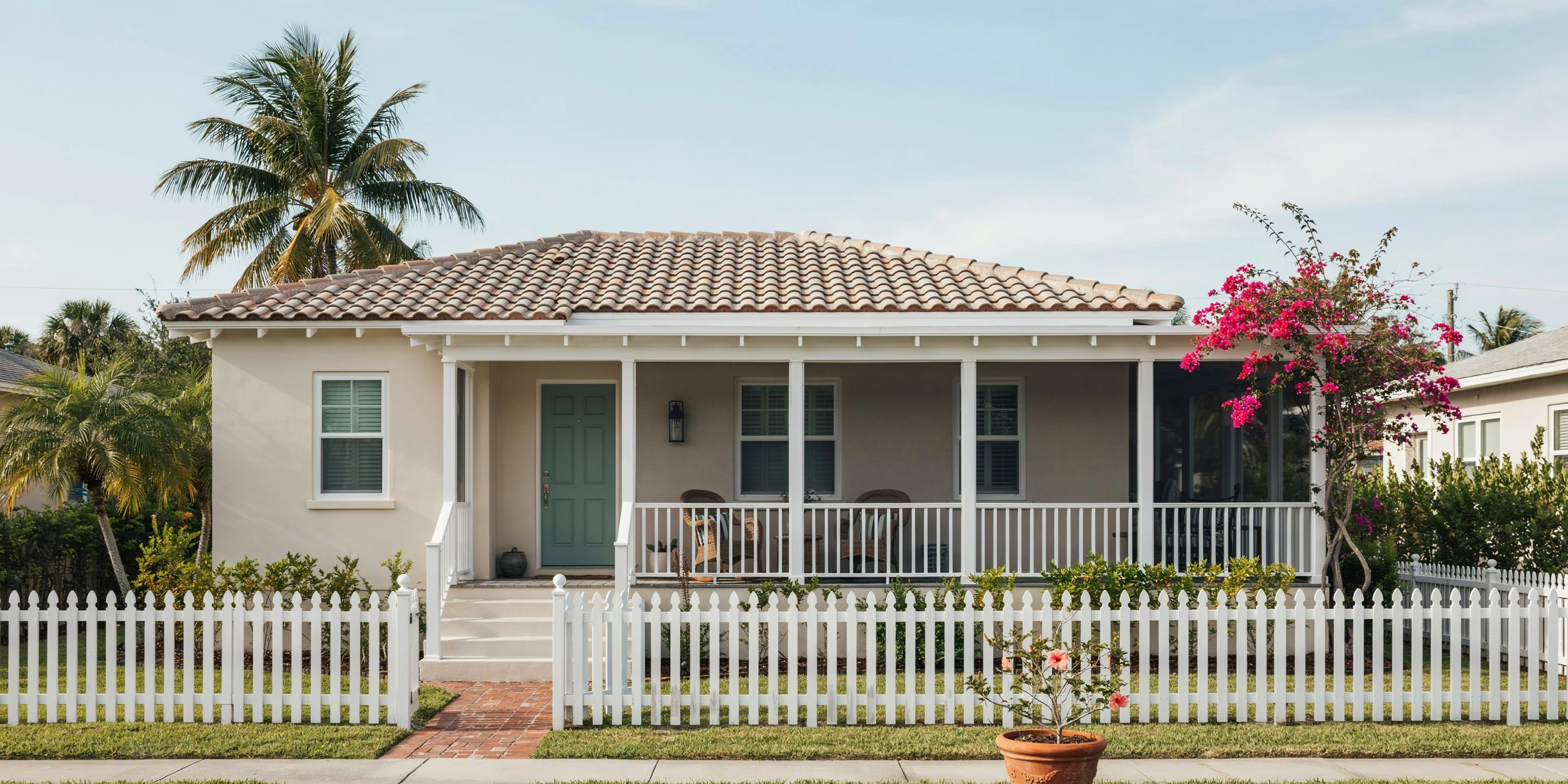 Pastel cottage with a screened porch in the Village of the Arts, Bradenton, FL